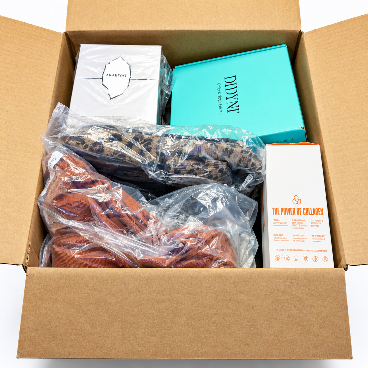 An open TikTok Shop Mystery Box showing example assorted merchandise; actual contents vary